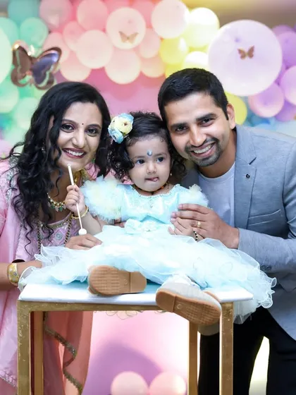A perfect family portrait to celebrate turning one. We make sure to capture these happy moments with the whole family during birthday celebrations, creating memories for everyone.