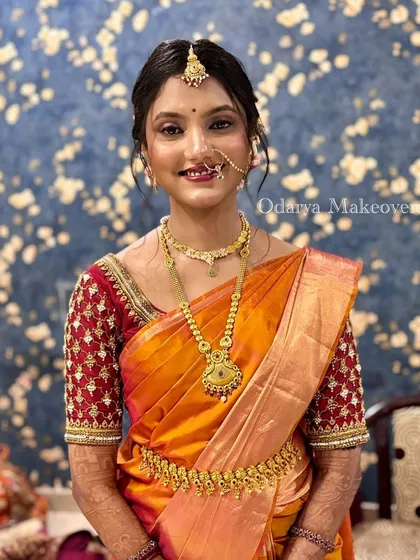 A full portrait of a stunning South Indian bride. I provide complete styling, including saree draping, to ensure the final look is exactly as you've dreamed, from head to toe.
