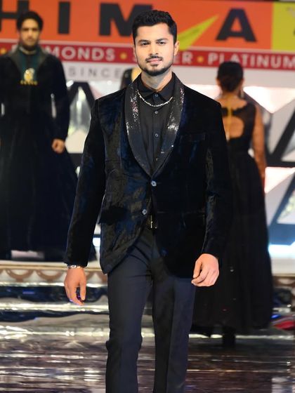 Walking for a Bhima Gold show, styled in a sharp, black velvet blazer. This look is all about classic elegance and sophistication.