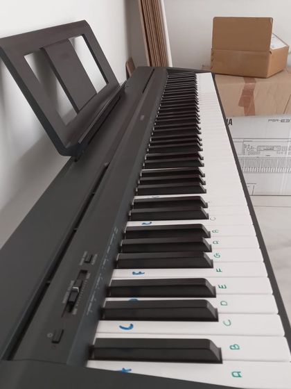 A close-up of one of our digital pianos, ready for the next lesson.