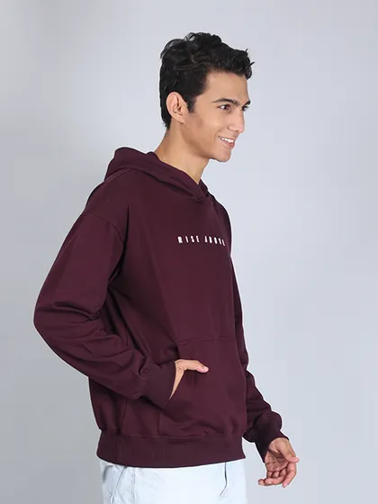 A duplicate of image 90, this relaxed side-profile shot is effective for showing how a hoodie fits during casual movement.