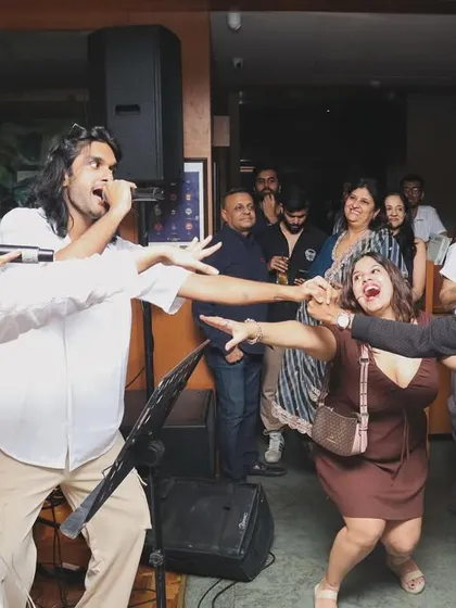 It's not just a show, it's an interactive experience. Here are our vocalists pulling members of the audience up to dance with us on stage.