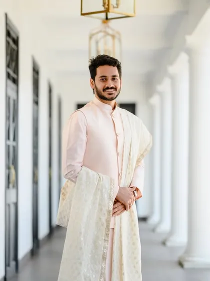 A classic groom portrait of Akshay at the Turf Club. The grand architecture provided a perfect backdrop, and he looks so dapper and at ease just before the wedding ceremonies began.