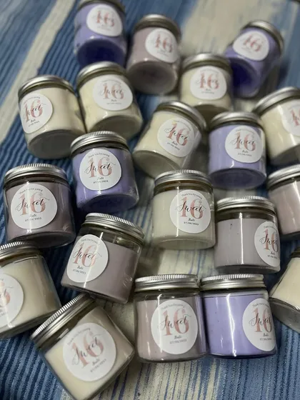 Custom candles for a "Sweet 16" birthday party. We can create custom stickers and colors for any milestone birthday.