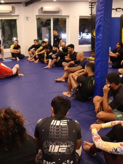A demonstration of a sweep from the guard during the seminar. Learning from different perspectives is key to growth.