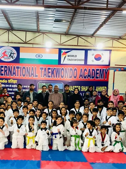 Another proud group photo from a Belt Promotion Test. The smiles and confident stances show the positive impact of our training.