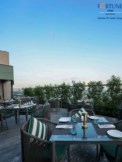 An evening view of Nakshatra, where the chic rooftop setup is perfect for conversations that last long into the night.