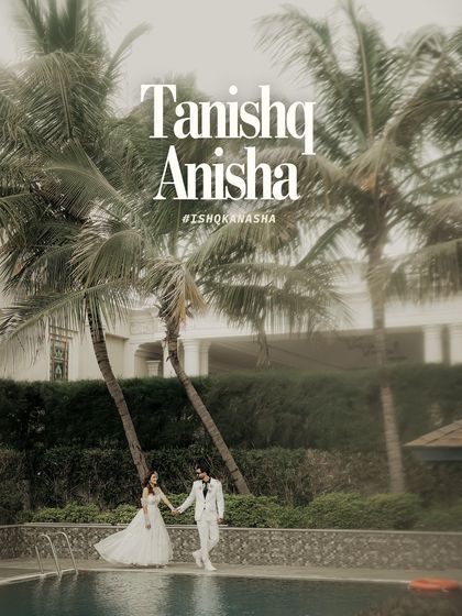 A modern fairytale moment. The couple walks hand-in-hand by the poolside, framed by palm trees, perfectly capturing the essence of a chic destination wedding.