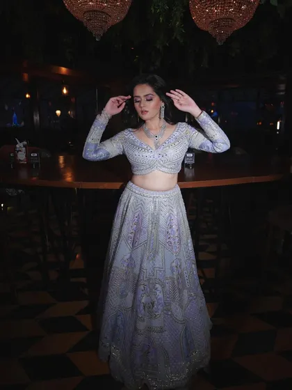 Even in a candid, twirling shot, the makeup stays put and looks stunning. Durability is key for event makeup.