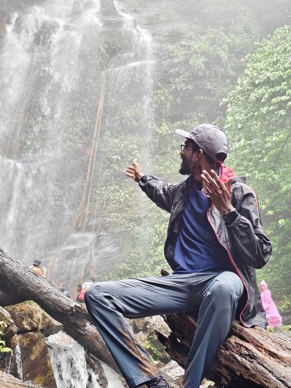A trekker enjoying a quiet moment by the Hidlumane Falls. The trail to Kodachadri is filled with these beautiful, refreshing stops.