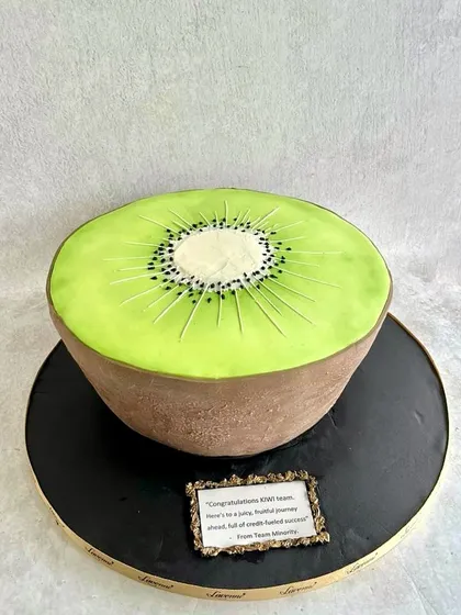 This was a fun and unusual request: a giant kiwi cake! We created this 5kg cake to look exactly like a sliced kiwi, and the team did an amazing job, especially with less than 24 hours' notice.