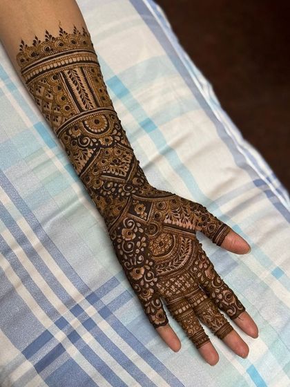 The fresh paste of the design, showing the dark, rich color of my organic henna.