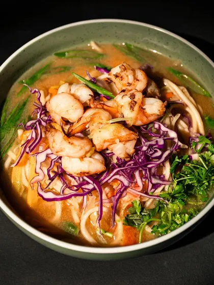 A soulful bowl of our Prawns Thukpa. This traditional Himalayan noodle soup is made with a rich, flavourful broth, tender noodles, crisp vegetables like cabbage and carrots, and topped with perfectly grilled prawns. It’s a complete, nourishing meal that feels like a warm hug.