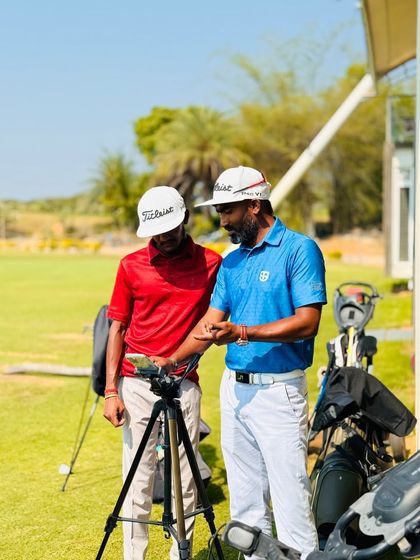 Our coaches are constantly on the range, providing hands-on instruction. From demonstrating a swing path to analyzing a student's setup, these moments of direct mentorship are where real progress is made.