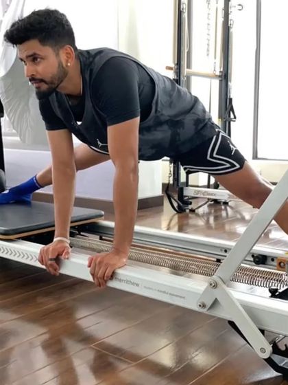 Another angle of Shreyas Iyer's focused flexibility work. The dedication he shows in the studio directly translates to his power and elegance as an athlete.