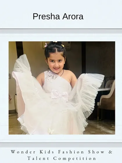 Congratulations and welcome, Presha Arora. Her playful energy in this beautiful white dress is delightful.