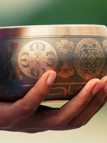 A detailed look at one of the beautiful, hand-crafted singing bowls I use in my meditation and healing sessions. The intricate symbols on the bowl represent ancient wisdom and the sacred nature of sound.