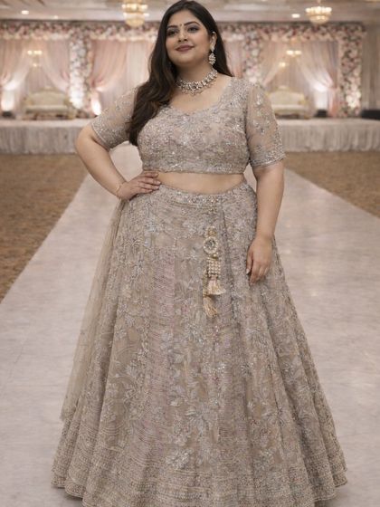 A confident pose in one of my favorite plus-size lehengas. The detailed craftsmanship and comfortable fit mean you don't have to compromise on style or comfort.