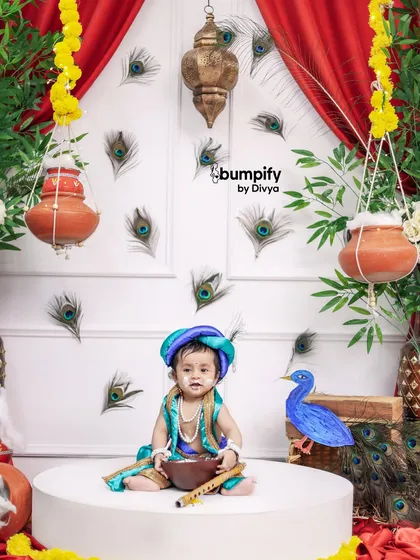 "Nand Ghar Anand Bhayo, Jai Kanhaiya Lal Ki!" This little Krishna is ready to steal some hearts, sitting with his bowl of makkhan and a flute.