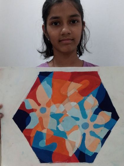 Saee, a 7th standard student, created this intricate 2D design using poster colours. The overlapping floral shapes create a beautiful transparent effect.