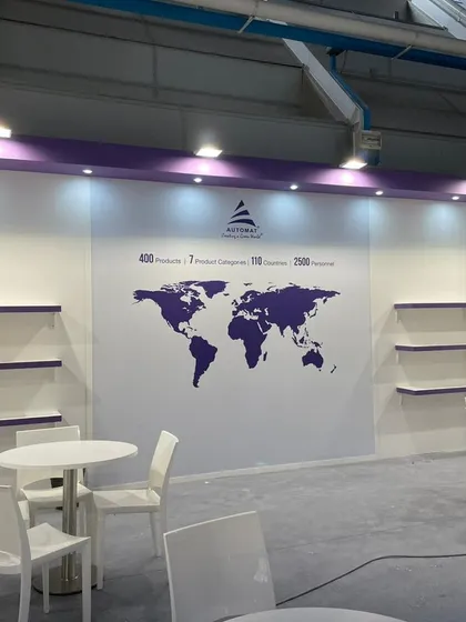 The calm before the storm. Our EIMA International booth being set up, with our global footprint map serving as a proud centerpiece.