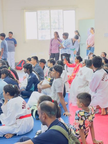 A candid moment of our team listening to announcements after winning 14 gold medals at the Karnataka State Championship. Now, we prepare for the nationals in Orissa.