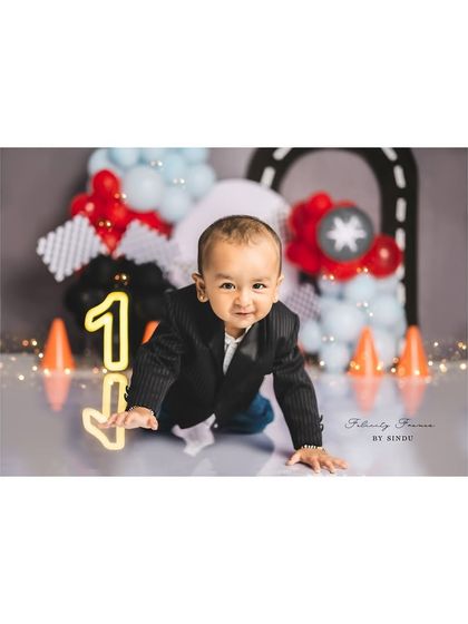 Crawling into his first year with style. This race car themed birthday shoot is perfect for a little boy with a need for speed.