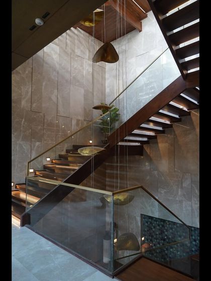 A stunning modern staircase in a completed home. I installed sensor-based lighting to make it both a safe and beautiful architectural feature.