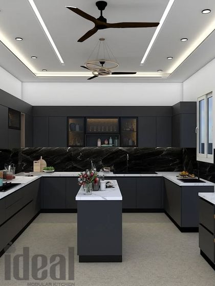 A complete overview of the contemporary black kitchen, highlighting its spacious layout and luxurious finishes. The combination of matte black, polished marble, and strategic lighting results in a space that is both functional and breathtakingly beautiful.