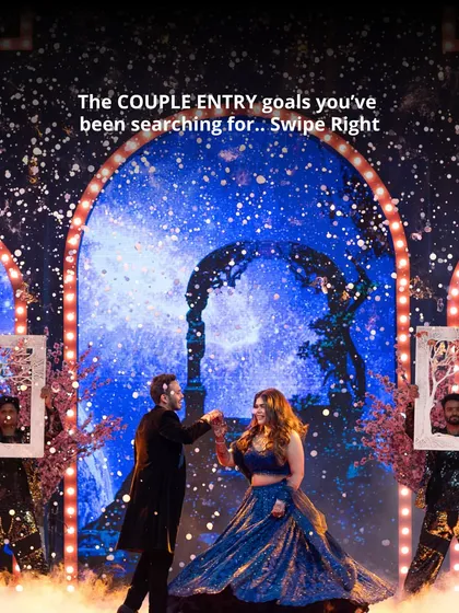 A magical couple's entry for their Sangeet, set against a backdrop of a thousand stars. We craft these moments to feel like a scene from your own personal fairytale.