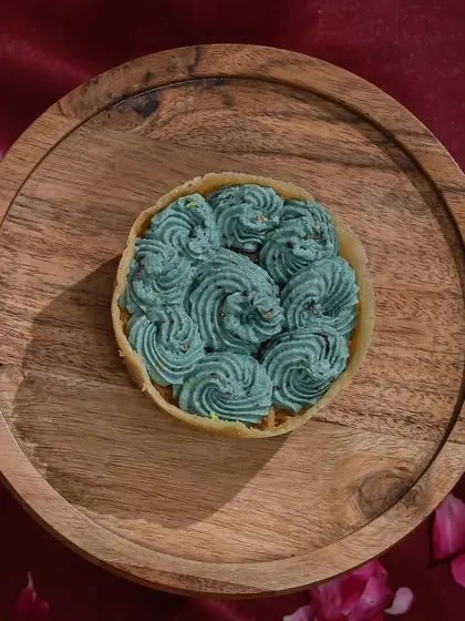 The unique and delicious blueberry ghewar, with its vibrant colour and fruity taste, is a modern festive delight.