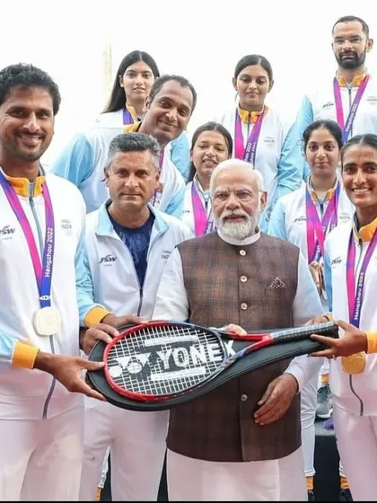 A moment of great honour as our Indian tennis team and I present a memento racket to the Honourable Prime Minister Shri Narendra Modi Ji, celebrating the medals won at the Asian Games.