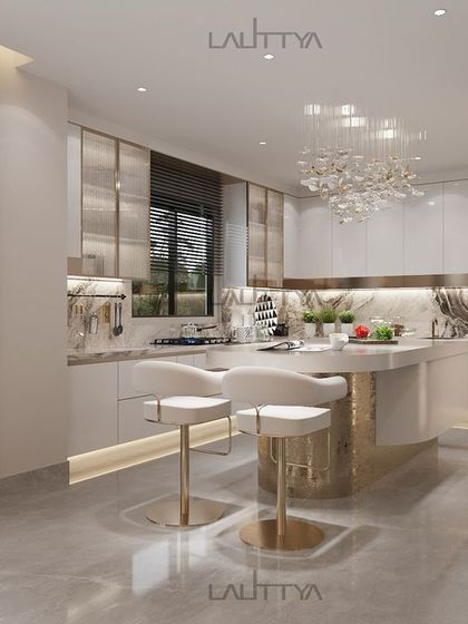 A modern luxury kitchen design blending elegance with functionality. This chic space features clean white cabinets, a gold-accented island with seating, marble countertops, and a statement chandelier, offering a perfect blend of luxury and minimalism.
