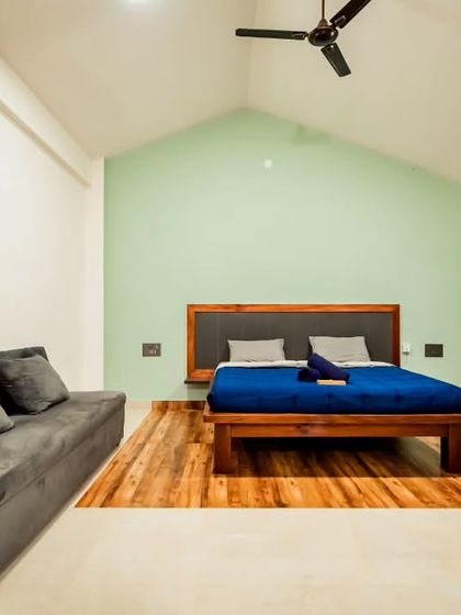 A clean, modern, and spacious room at a hostel in Chikmagalur. I ensure that even budget-friendly options are comfortable and well-designed, providing a great base for your adventures in the hills.