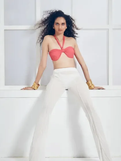This image captures a strong and confident pose. The hair and makeup are styled to be effortlessly chic, demonstrating my ability to create looks that are both fashionable and commercially appealing.