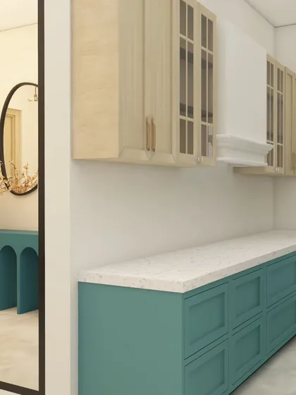 This custom crockery unit was designed for the ATS Nobility dining space. The dual-tone finish with teal and light wood connects it to the rest of the home's color scheme, providing ample storage with a stylish look.