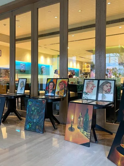 A wide view of my paintings exhibited at the beautiful ITC Gardenia.