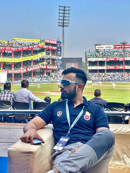 Taking in the action during the India vs Australia test match at the Arun Jaitley Stadium. Being on-site with the teams provides crucial context and allows me to observe the real-world application of our training.