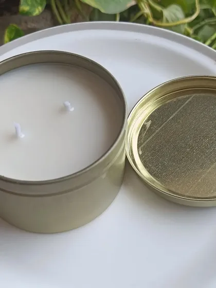 The golden tin jar with its lid off, ready for custom branding.