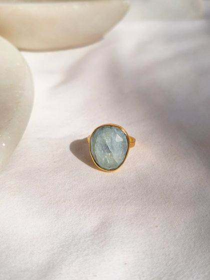 A beautiful shot of the Aquamarine Soul Ring in the light. Aquamarine is known to calm the mind, cleanse heavy emotions, and invite peaceful communication.