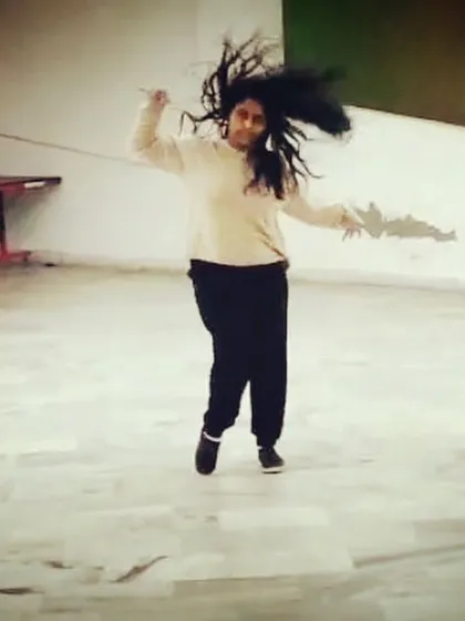 A moment of pure release while dancing. This is the feeling I aim to bring to my students, helping them connect with the music and move without inhibition, which is the key to a great performance.