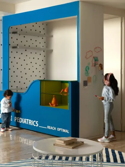 I believe design can heal. For this pediatric clinic, I created a playful, interactive unit in a bold blue. It features a whiteboard for drawing, display niches for toys, and varied textures to engage a child's senses and turn a clinical visit into a positive experience.