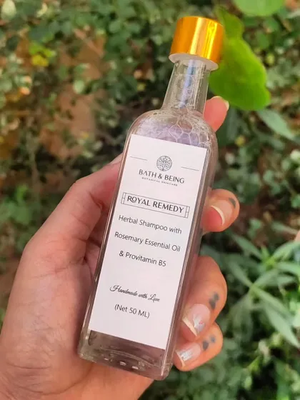 The Royal Remedy Herbal Shampoo included in a custom gift set. This mini bottle is packed with rosemary essential oil and provitamin B5 for healthy, happy hair.