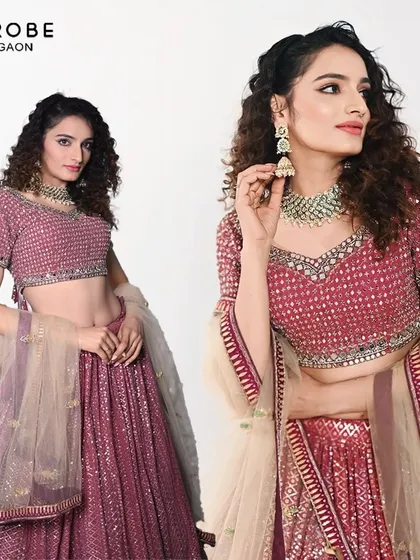 Rent elegance, own the moment. This model showcases a beautiful sequined lehenga in a lovely shade of pink, perfect for a party or reception.