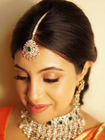 A closer look at the radiant makeup for Priyanka's baby shower. The soft shimmer on the eyes and the glowing skin create a look that is both gentle and celebratory.