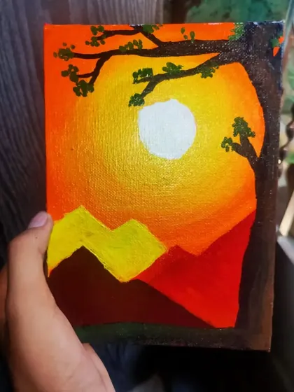 Ishan, an 8th standard student, captured a brilliant sunset using acrylics on a small canvas. The bold colors and silhouette of the tree create a very dramatic landscape.
