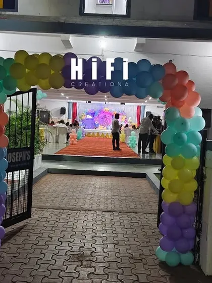 The celebration starts at the entrance. For this butterfly-themed party, I built a vibrant, multi-colored balloon arch over the main gate, creating a cheerful and exciting welcome for all the guests as they arrived.