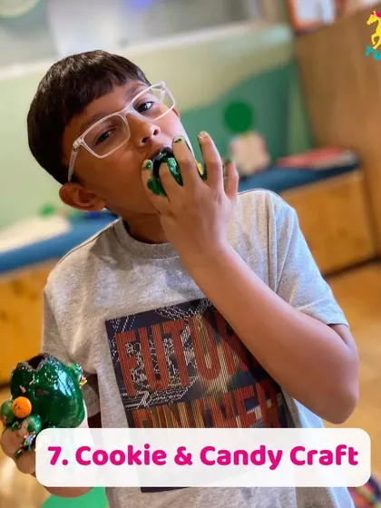 The best part of cookie decorating? Tasting your creation! This young chef is enjoying the sweet rewards of his artistic work.