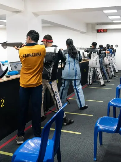 An action shot from Day 9 of the CISCE games, showing the state-of-the-art electronic scoring systems in use for each lane.