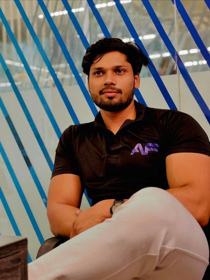 A relaxed photo in the gym office. I am always available to discuss your fitness goals.